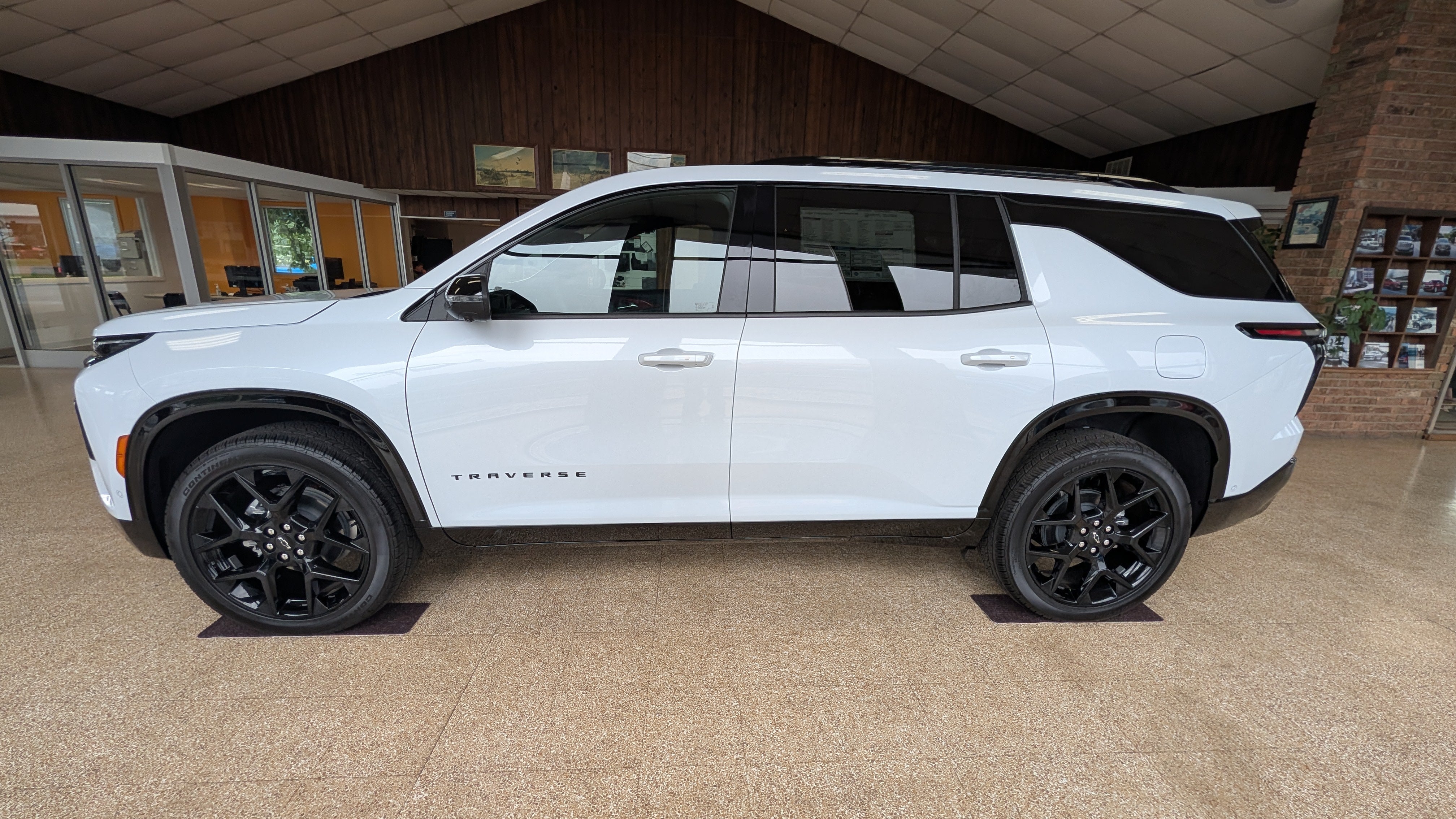 2026 Chevrolet Traverse RS in Polar White Tricoat — front three-quarter view